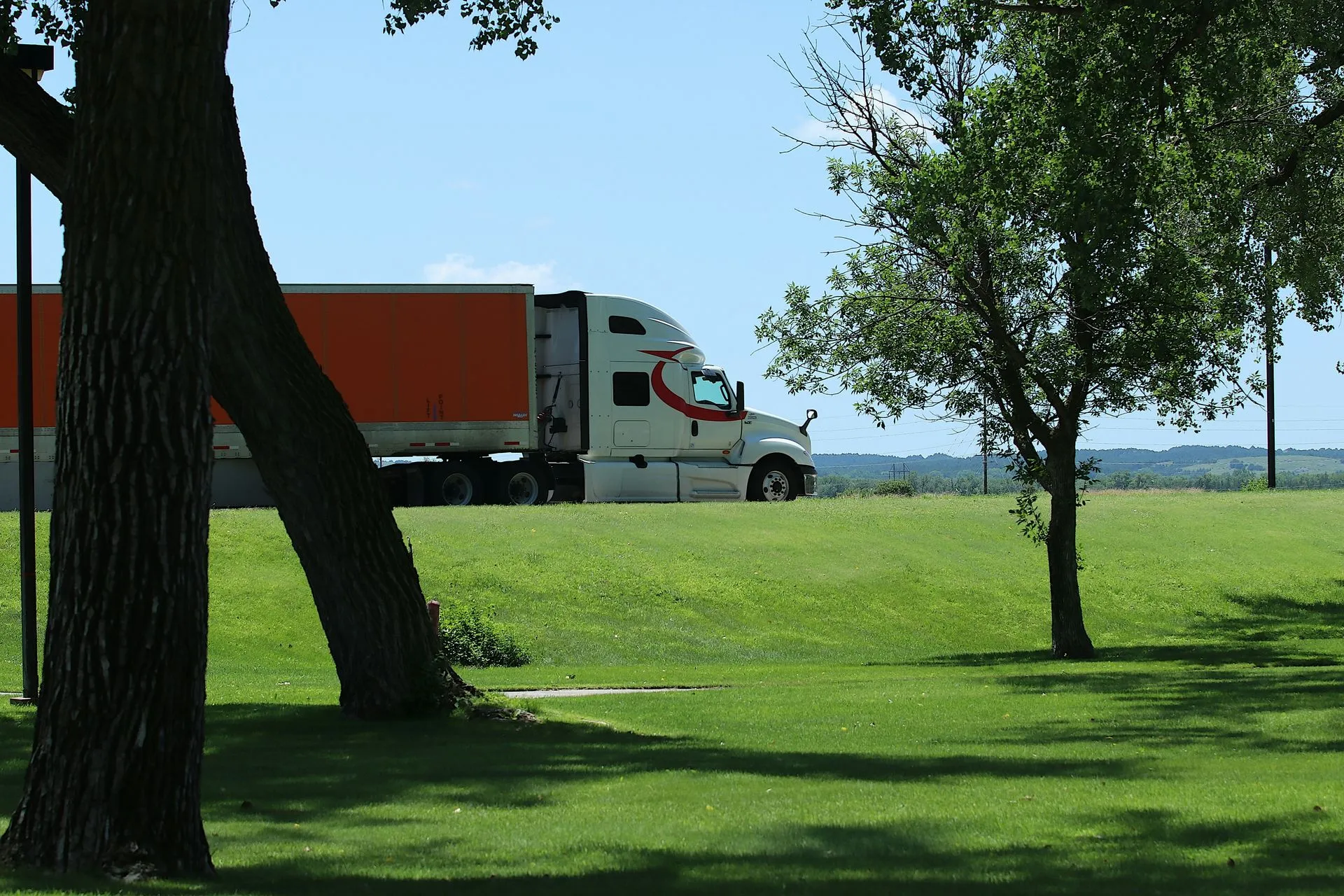 NH Logistics truck on the road
